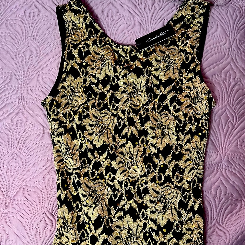 New with tag size small Candalite long dress. Black & gold.